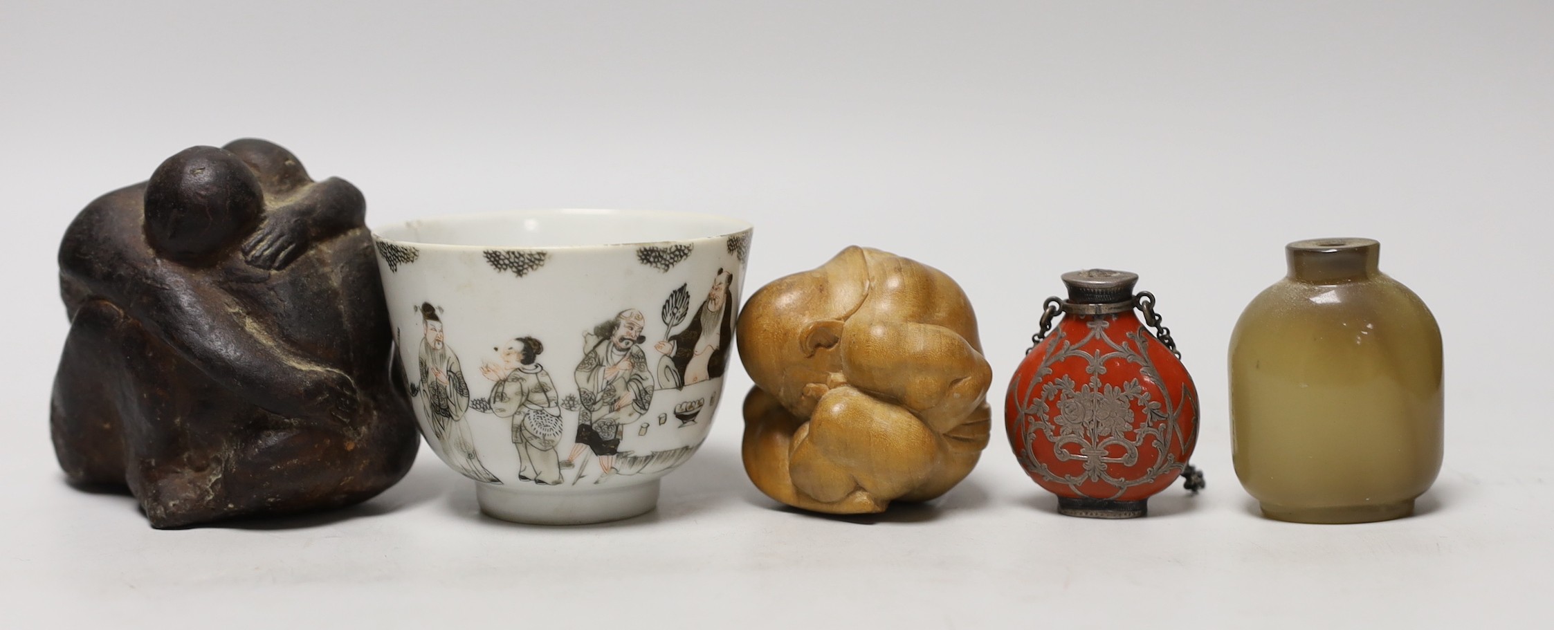 A 19th century Chinese enamelled porcelain cup, two carvings and two scent bottles